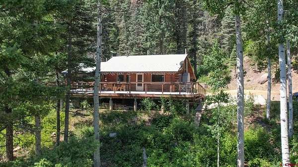 5.46 Acres of Residential Land with Home for Sale in Pagosa Springs, Colorado