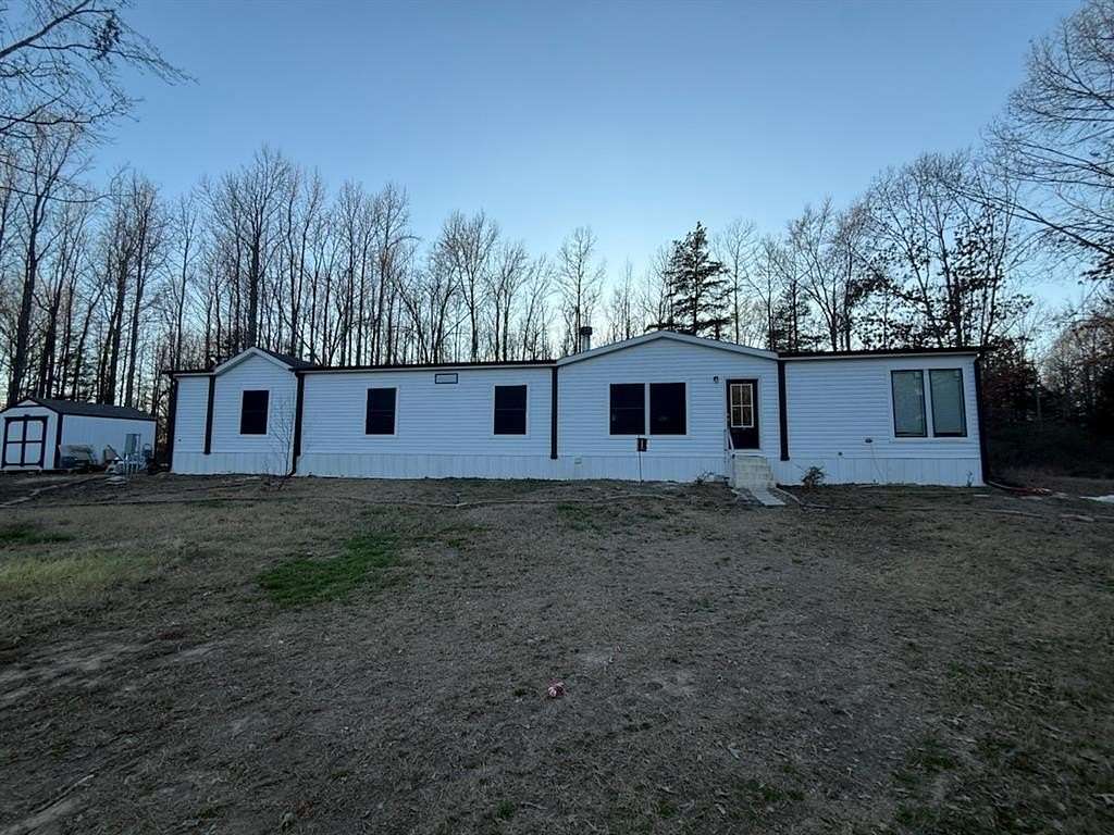 9.82 Acres of Land with Home for Sale in Sulphur Springs, Texas