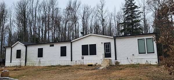 9.82 Acres of Residential Land with Home for Sale in Sulphur Springs, Texas