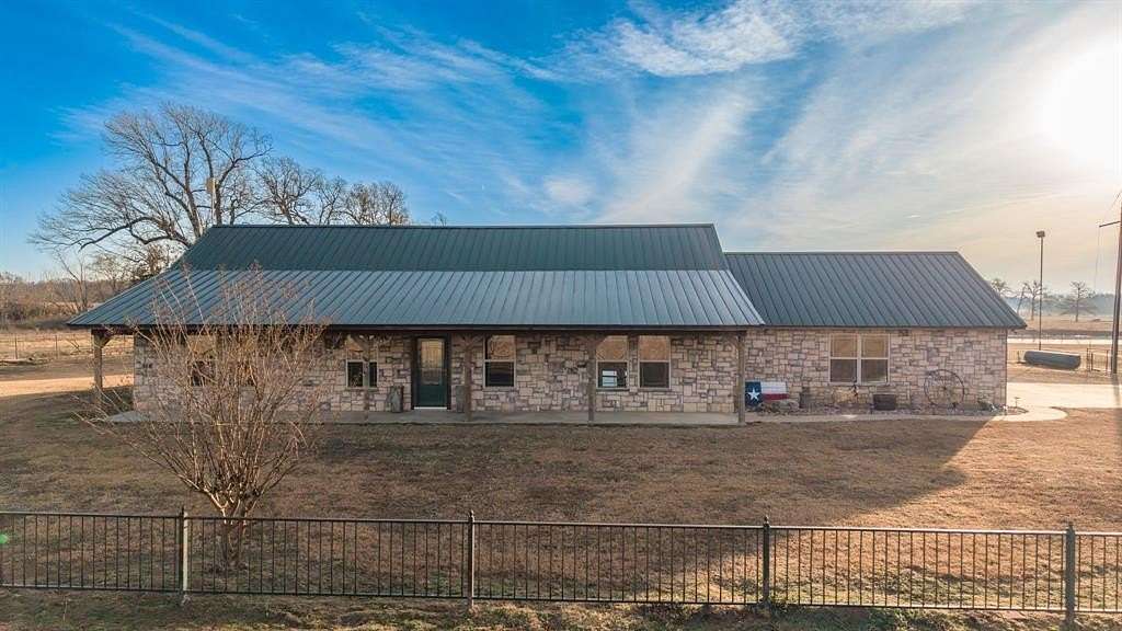 5.36 Acres of Residential Land with Home for Sale in Blossom, Texas