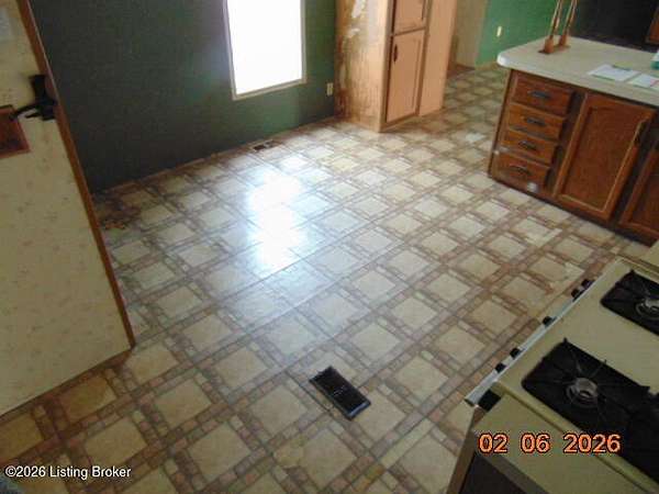 1.68 Acres of Residential Land with Home for Sale in Garfield, Kentucky