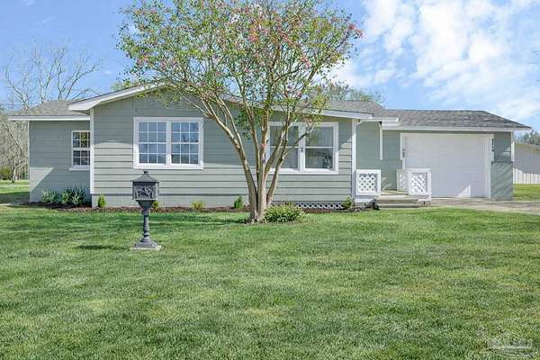 2 Acres of Residential Land with Home for Sale in Century, Florida