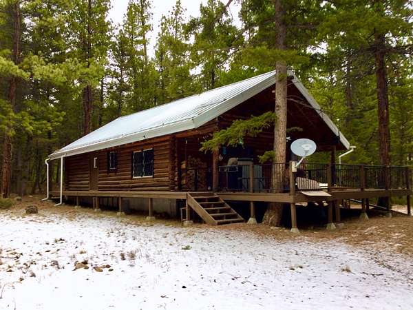 11.5 Acres of Recreational Land with Home for Sale in Wolf Creek, Montana