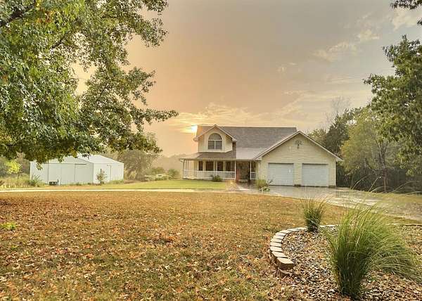 22 Acres of Land with Home for Sale in El Dorado Springs, Missouri
