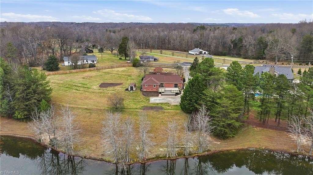 1.8 Acres of Residential Land with Home for Sale in Summerfield, North Carolina