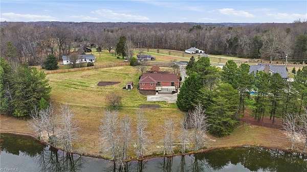 1.8 Acres of Residential Land with Home for Sale in Summerfield, North Carolina