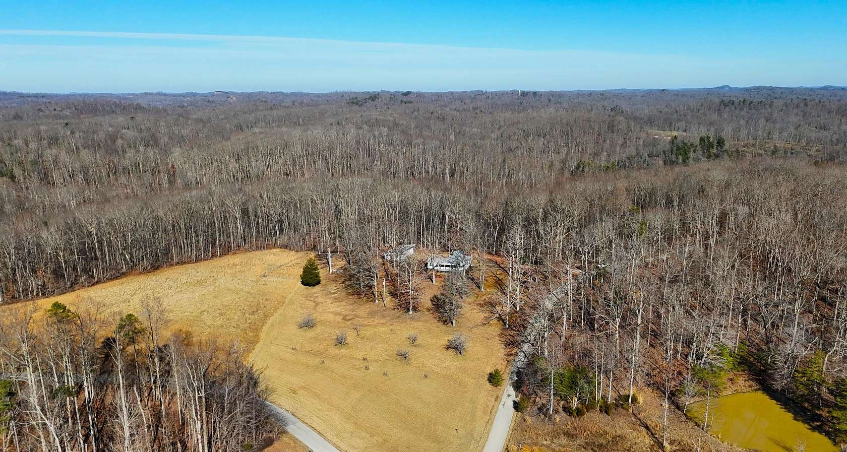 28.5 Acres of Land with Home for Sale in Irvine, Kentucky