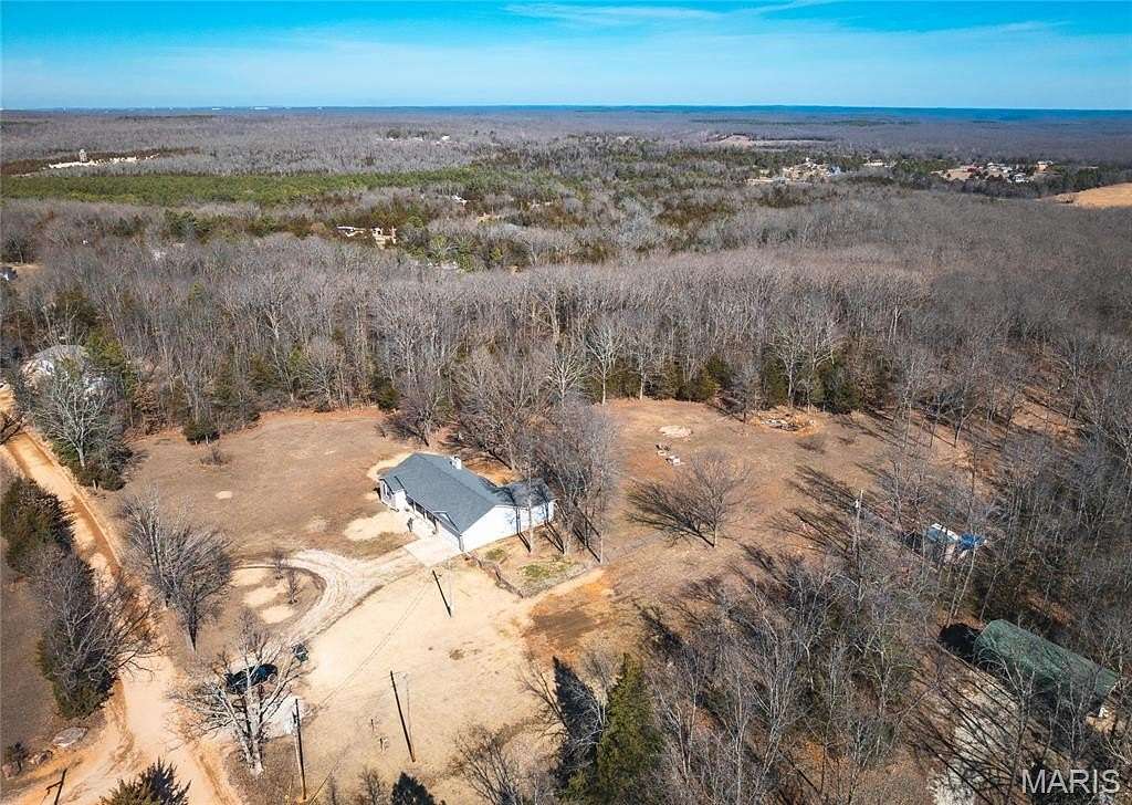 15.3 Acres of Recreational Land with Home for Sale in Plato, Missouri