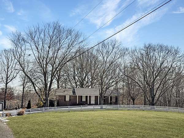 5 Acres of Land with Home for Sale in Dover, Tennessee