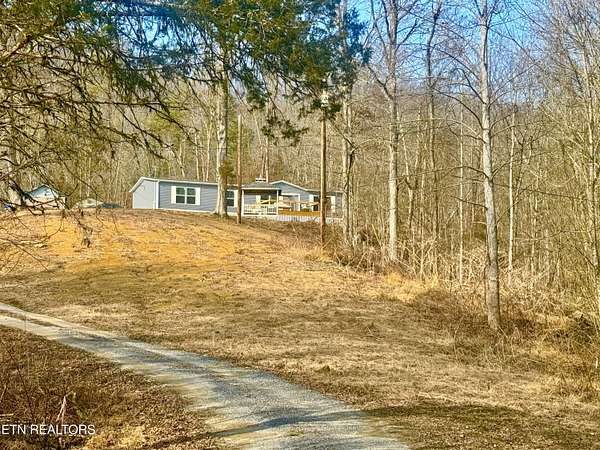 1.8 Acres of Residential Land with Home for Sale in Luttrell, Tennessee