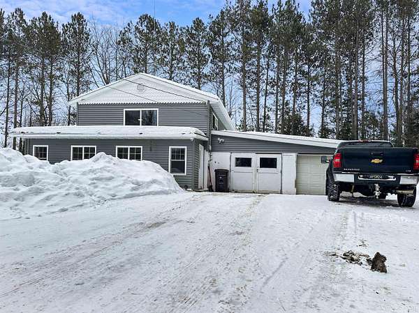 5.73 Acres of Residential Land with Home for Sale in Escanaba, Michigan