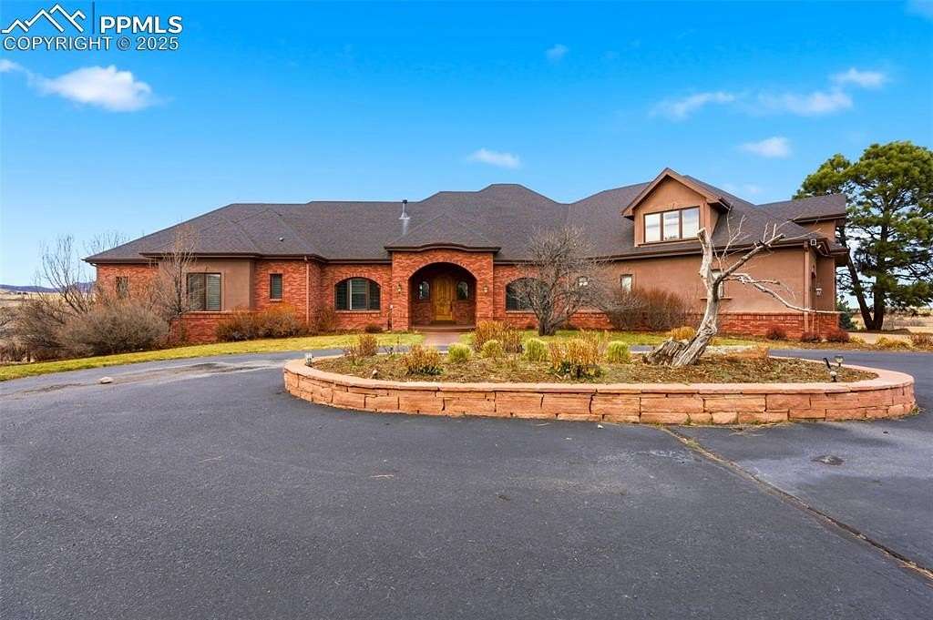 10.9 Acres of Land with Home for Sale in Sedalia, Colorado