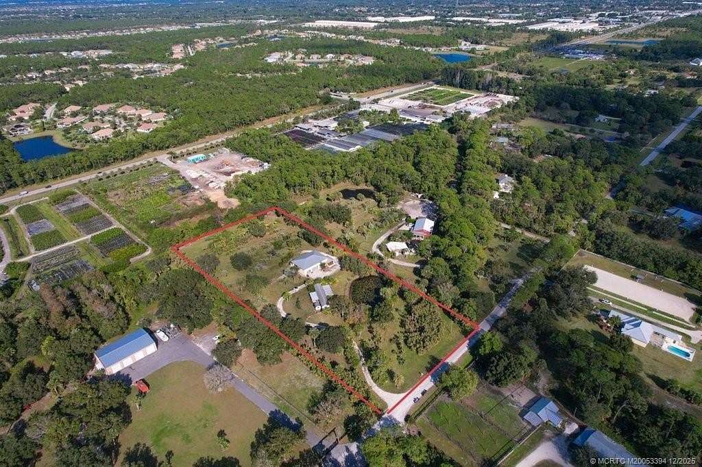 4.66 Acres of Residential Land with Home for Sale in Palm City, Florida