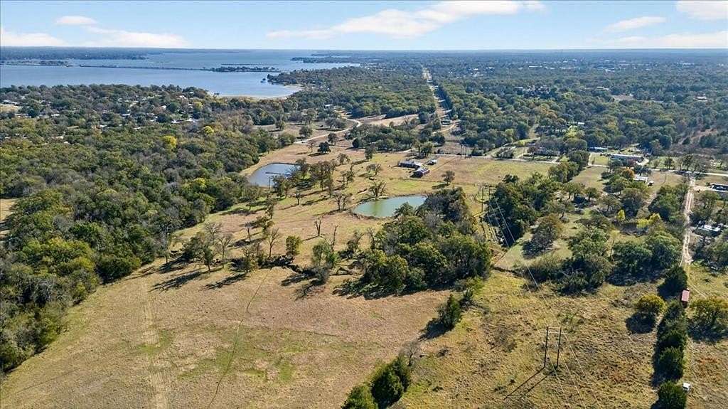 151 Acres of Agricultural Land with Home for Sale in Seven Points, Texas