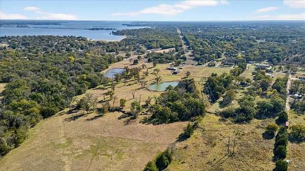 151 Acres of Agricultural Land with Home for Sale in Seven Points, Texas