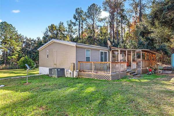 10.4 Acres of Land with Home for Sale in Reddick, Florida