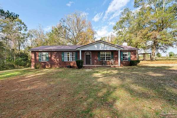 2 Acres of Residential Land with Home for Sale in Century, Florida