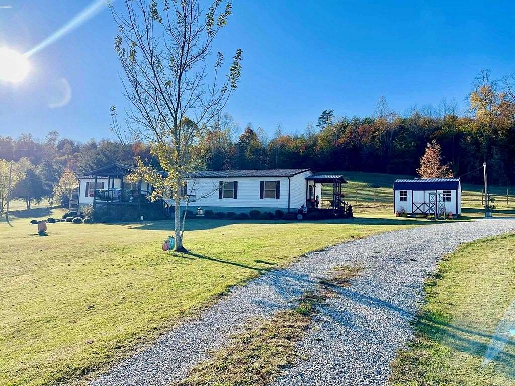 3 Acres of Residential Land with Home for Sale in Blaine, Kentucky