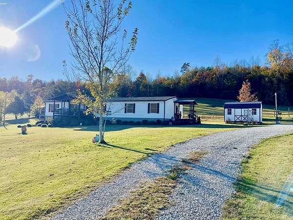 3 Acres of Residential Land with Home for Sale in Blaine, Kentucky