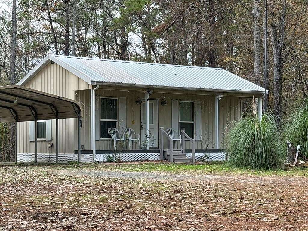 0.68 Acres of Residential Land with Home for Sale in Joaquin, Texas