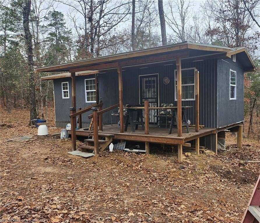 32 Acres of Land with Home for Sale in Parks, Arkansas