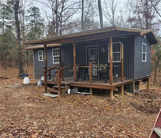 32 Acres of Land with Home for Sale in Parks, Arkansas