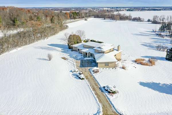 2.7 Acres of Residential Land with Home for Sale in Summit Village, Wisconsin