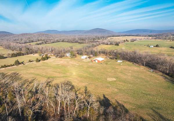 235 Acres of Land with Home for Sale in Patterson, Missouri