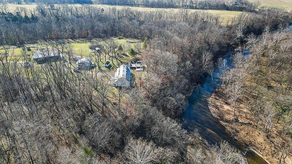 9.1 Acres of Land with Home for Sale in Anderson, Missouri