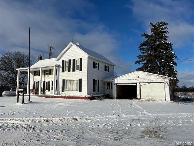 2.5 Acres of Residential Land with Home for Sale in Columbiaville, Michigan