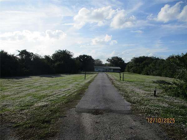 4.57 Acres of Residential Land with Home for Sale in Okeechobee, Florida