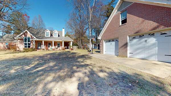 12.9 Acres of Land with Home for Sale in Olive Branch, Mississippi