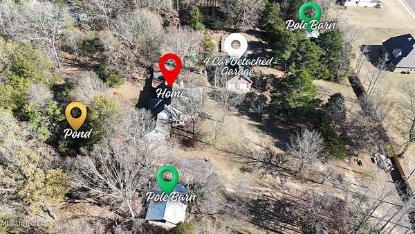 12.9 Acres of Land with Home for Sale in Olive Branch, Mississippi