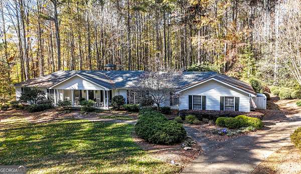 6 Acres of Residential Land with Home for Sale in Alpharetta, Georgia