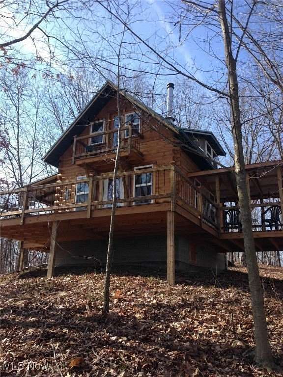 6.87 Acres of Residential Land with Home for Sale in Kimbolton, Ohio