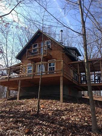 6.87 Acres of Residential Land with Home for Sale in Kimbolton, Ohio