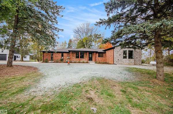 2 Acres of Land with Home for Sale in Washington Township, Michigan