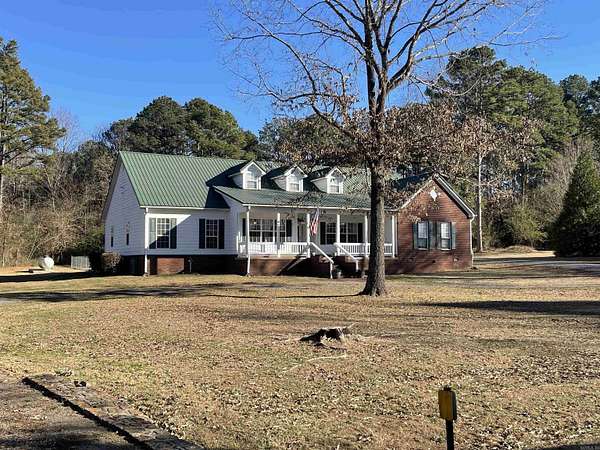 1.5 Acres of Residential Land with Home for Sale in Greers Ferry, Arkansas