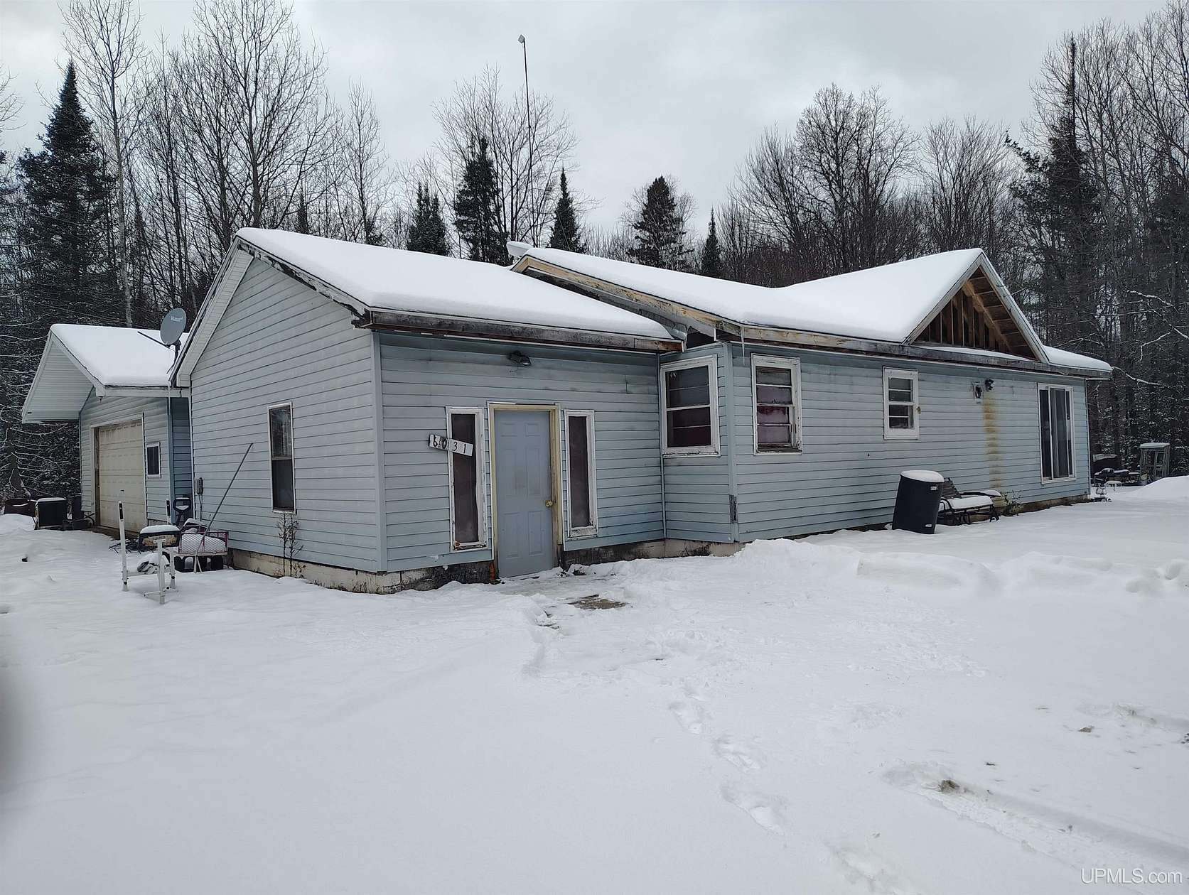 1.5 Acres of Residential Land with Home for Sale in Gladstone, Michigan