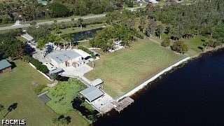 2 Acres of Land with Home for Sale in Moore Haven, Florida