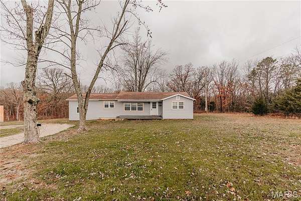 3.9 Acres of Residential Land with Home for Sale in Dixon, Missouri
