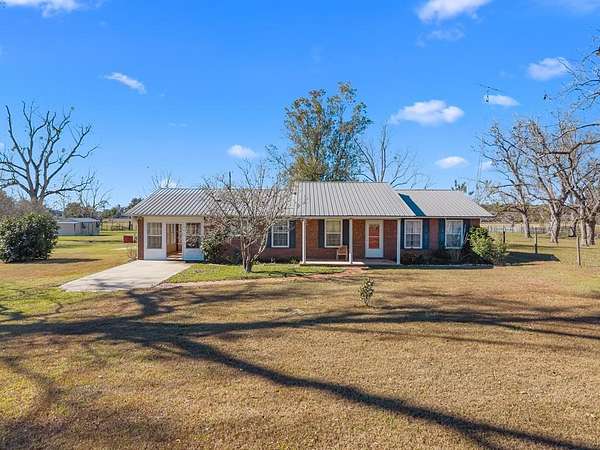 10 Acres of Land with Home for Sale in Chiefland, Florida