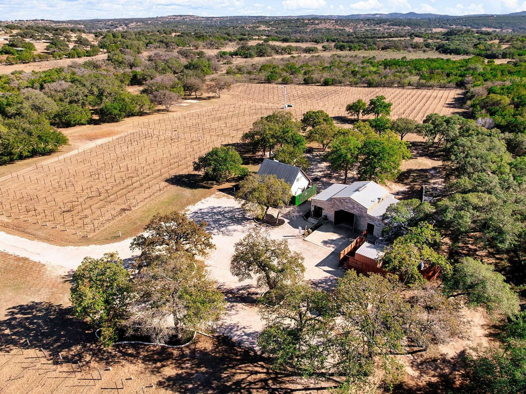 46.5 Acres of Agricultural Land with Home for Sale in Round Mountain, Texas