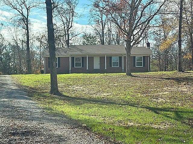 6.6 Acres of Residential Land with Home for Sale in Adamsville, Tennessee