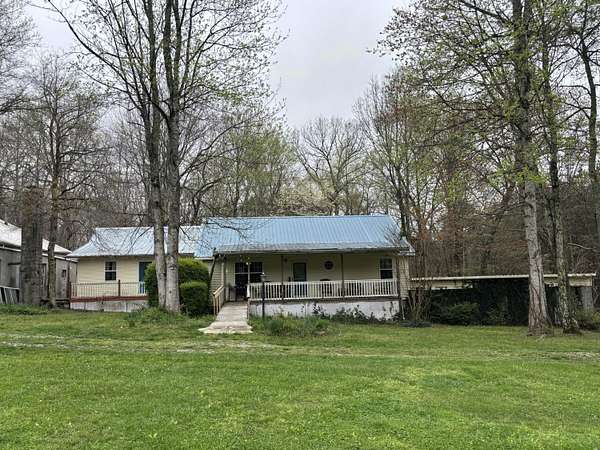 7.4 Acres of Residential Land with Home for Sale in Dayton, Tennessee