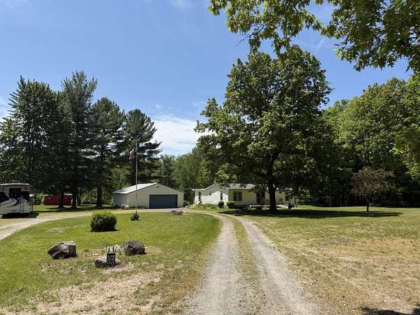 10 Acres of Recreational Land with Home for Sale in Hart, Michigan