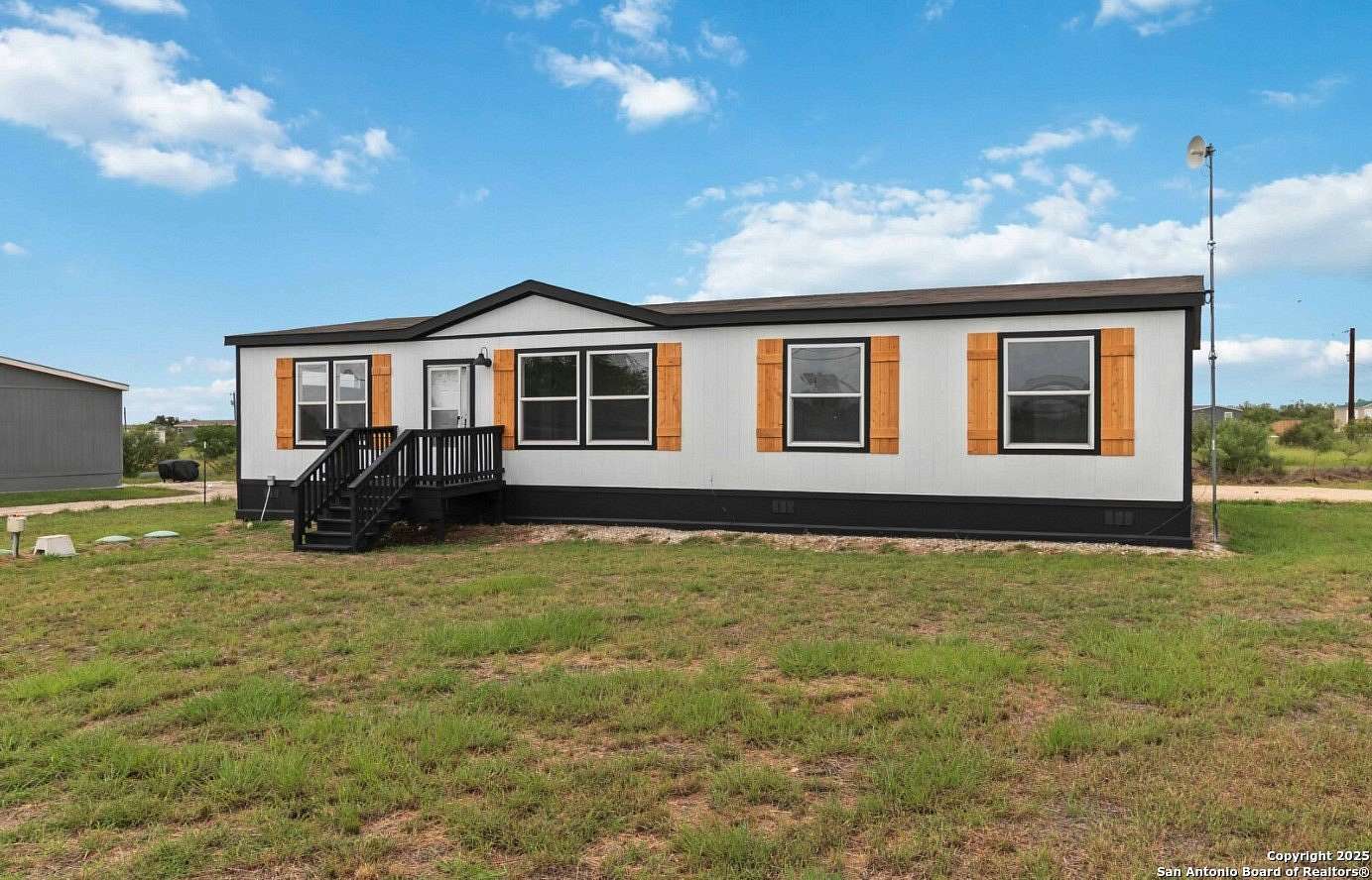 5 Acres of Residential Land with Home for Sale in Moore, Texas