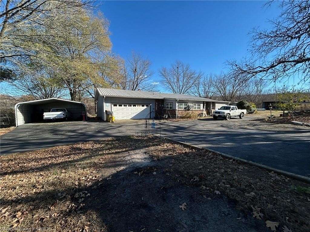 2.53 Acres of Residential Land with Home for Sale in Pocola, Oklahoma