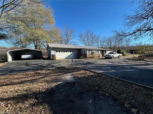 2.53 Acres of Residential Land with Home for Sale in Pocola, Oklahoma