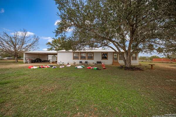 1.63 Acres of Residential Land with Home for Sale in Pleasanton, Texas